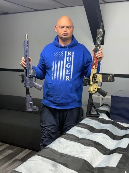 Justin Watts with items from his personal collection